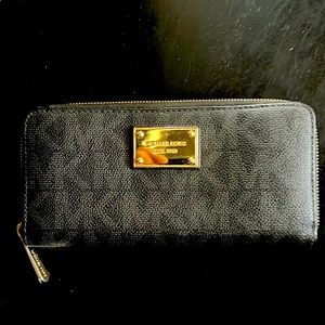 Michael Kors large zip around wallet, black with MK logo